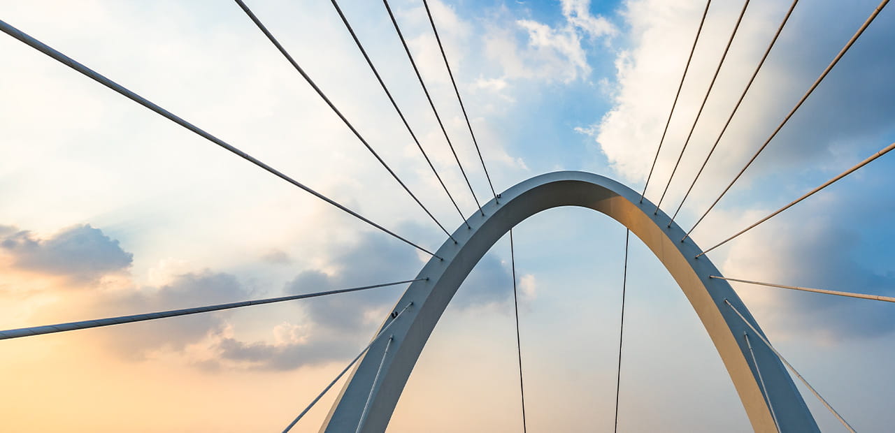 Modern bridge reflecting the stability and diversification of private credit as a retirement income strategy.